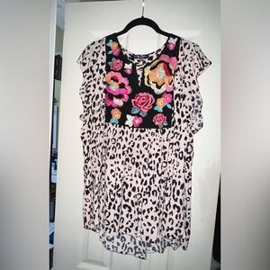 Flowy embroidered blouse with flutter sleeves!